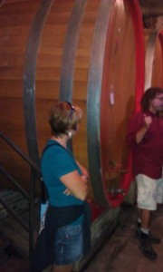 Photo of Julie and a 4,000 hectoliter cask at