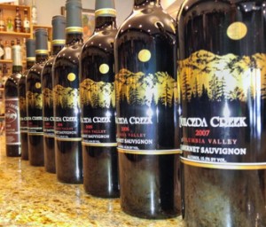 Photo of bottles of Quilceda Creek pre-tasting.