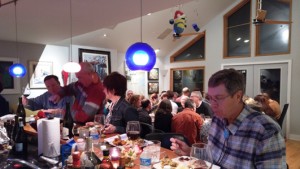 Photo of people enjoying pre-Thanksgiving dinner.